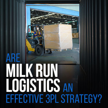 forklift loading a pallet on a truck